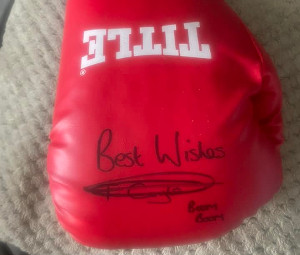 Tommy Coyle donated signed gloves